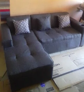 Brand new Charcoal Grey L-Shape Couch with 3scatter cushions and cupholder on sale &#64; R2999