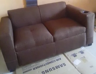 Brand new Brown 2seater couch with cupholder on sale &#64; R1499