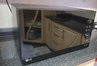 LG Smart Diagnosis technology Black mirror finish microwave