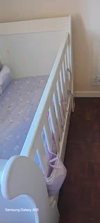 Baby white wooden cot bed