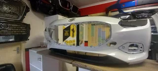 2025 SWIFT (SUZUKI)  FRONT BUMPER WITH LOWER SPOILER