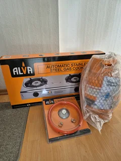 Alva gas cooker, cylinder & regulator set. New, unused in original sealed packaging.