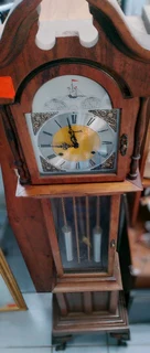 Antique ball and claw grandfather clock