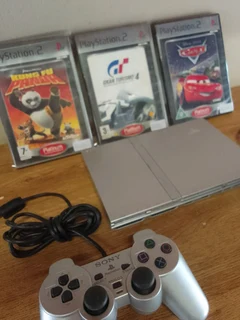 Ps2 plus 2 remotes and 4 games