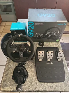 Logitech G920 like new in boxes