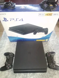 PlayStation 4 slim with 2 remotes and upgraded 1tb SSD