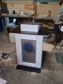 A Custom-designed White With Wood And A Frosted Acrylic Front At Pulpiits And Podiums