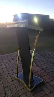 A Curved Steel Church Stand In Various Colors