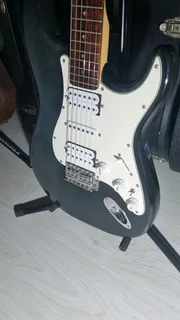 Aria STG series electric guitar and bag