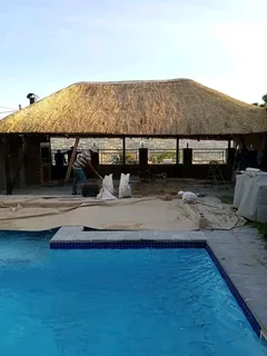 Thatch roof installation and maintenance