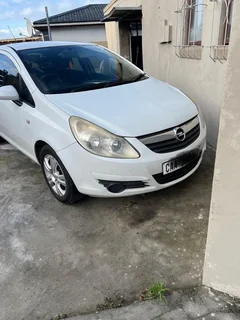 White Opel Corsa Hatchback