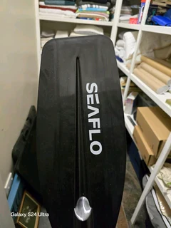 Inflatable kayak with oars and pump