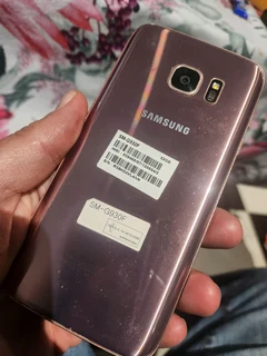 Samsung Soundbar and S7 cellphone