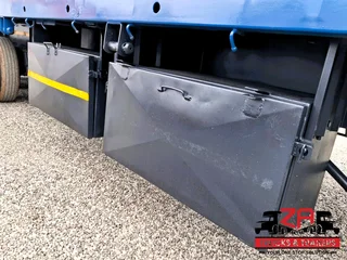 2013 PARAMOUNT TRI-AXLE FLAT DECK TRAILER