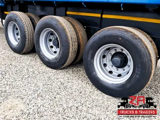 2013 PARAMOUNT TRI-AXLE FLAT DECK TRAILER