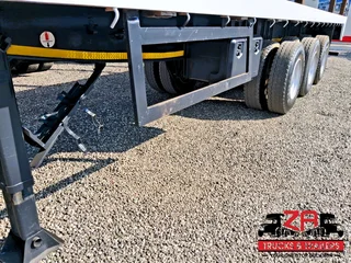 2016 ROYAL TRUCK BODIES TRI-AXLE FLAT DECK