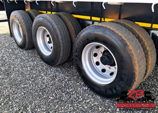 2016 ROYAL TRUCK BODIES TRI-AXLE FLAT DECK