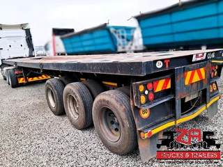 2006 HENRED FREUHAUF TRI-AXLE FLAT DECK
