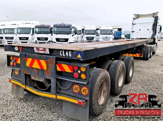 2006 HENRED FREUHAUF TRI-AXLE FLAT DECK