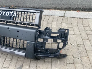 2025 TOYOTA LAND CRUISER PRADO VX-R FRONT BUMPER FOR SALE. IN EXCELLENT CONDITION