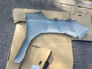 2022 TOYOTA URBAN CRUISER/SUZUKI VITARA BREZZA LEFT FRONT FENDER FOR SALE. BRAND NEW OEM