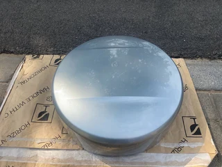 2010 DAIHATSU TERIOS COMPLETE SPARE WHEEL COVER FOR SALE. IN PRISTINE CONDITION