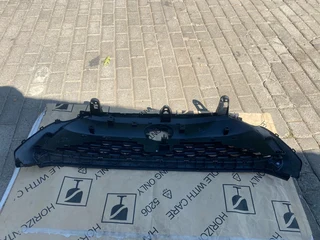 2024 TOYOTA COROLLA CROSS HYBRID XR RADIATOR GRILLE FOR SALE. IN EXCELLENT CONDITION