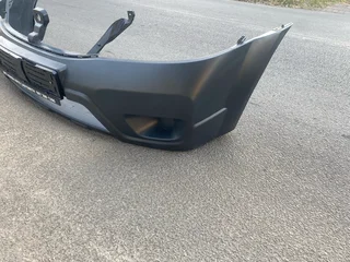 2024 NISSAN NP200 FRONT BUMPER FOR SALE. IN PRISTINE CONDITION