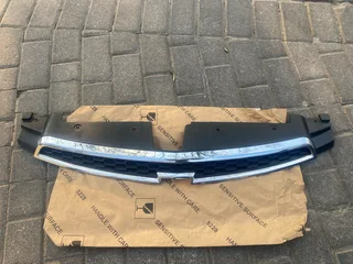 2013 CHEVROLET CRUZE UPPER RADIATOR GRILLE FOR SALE. IN PRISTINE CONDITION