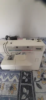 Finesse Sewing machine for sale.