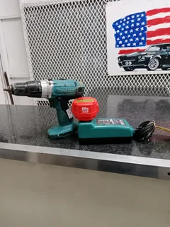 Makita cordless drill with charger 79Oct25