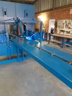 Twin vertical breakdown saws