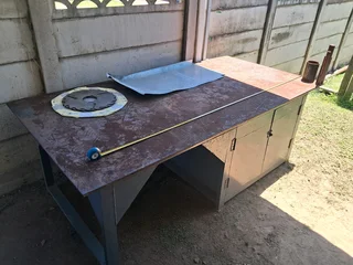 Welding table with cabinet