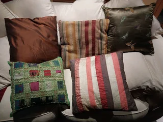 Cushions, 9 of  Various shapes and colours