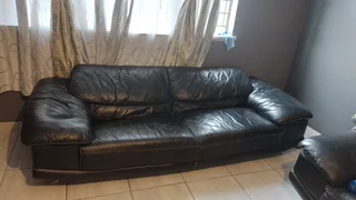 Gerald Yosh Black leather long seater couch (sears up to 4)