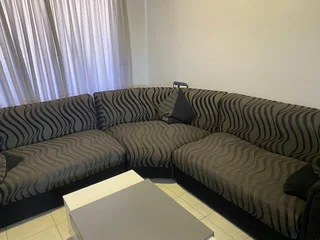 L shape big couch for sale.