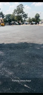 Road surfacing, road markings, fog spray, slurry seal