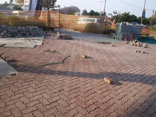 Brick paving  and tar surfacing