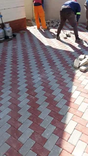 Brick paving and tar surfacing