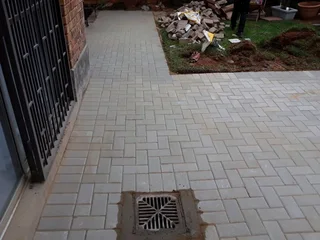 Brick paving and tar surfacing