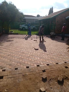 Brick paving and tar surfacing