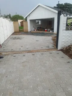 Brick paving and tar surfacing