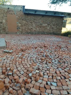 Brick paving and tar surfacing