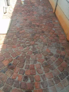 Cobble half brick paving  and tar surfacing
