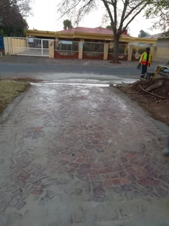 Cobble half brick paving  and tar surfacing