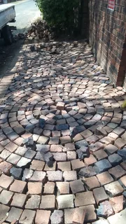 Cobble half brick paving  and tar surfacing