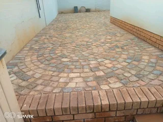 Cobble half brick paving  and tar surfacing