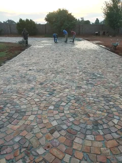 Cobble half brick paving  and tar surfacing