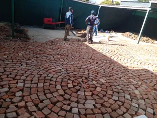 Cobble half brick paving  and tar surfacing