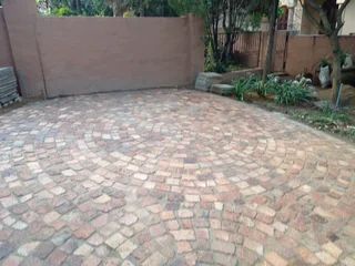 Cobble half brick paving  and tar surfacing